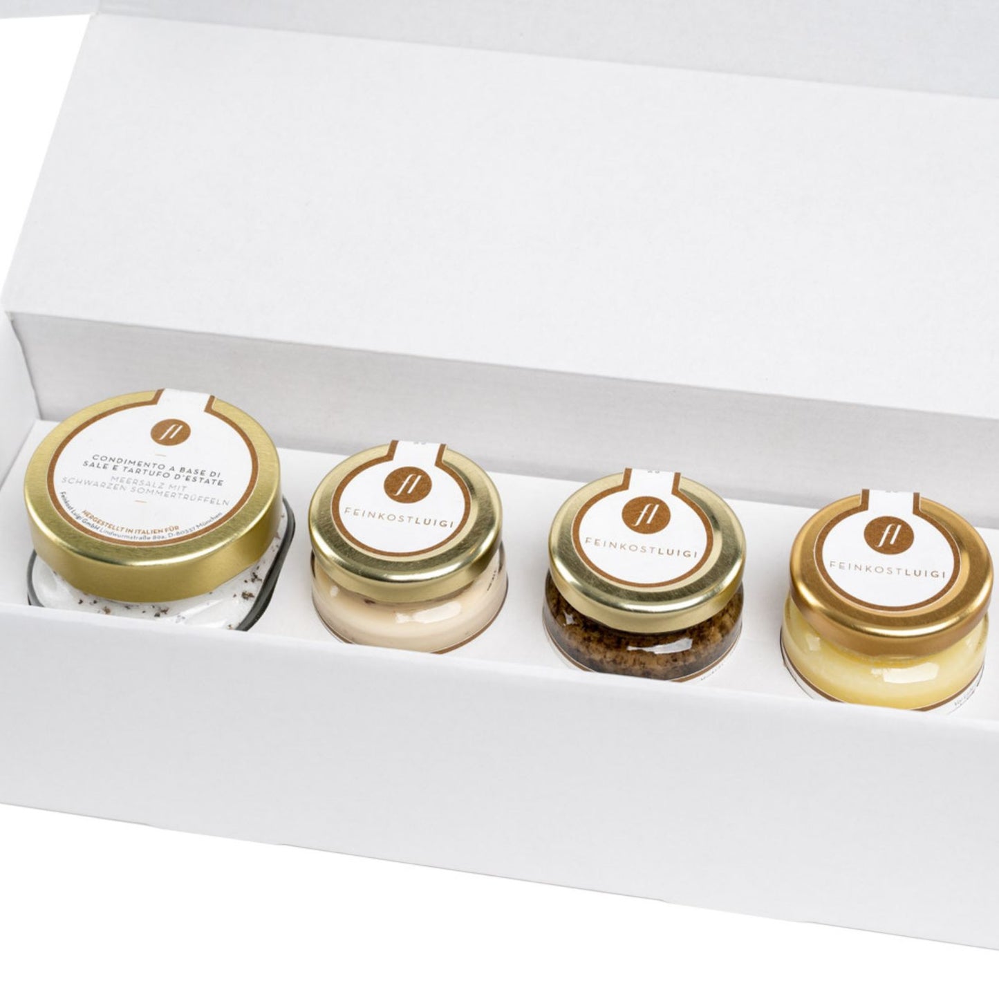 TRÜFFELBOX MIT TRÜFFELSALZ, SALSA MIT SCHWARZEN UND WEISSEN TRÜFFELN SOWIE TRÜFFELBUTTER