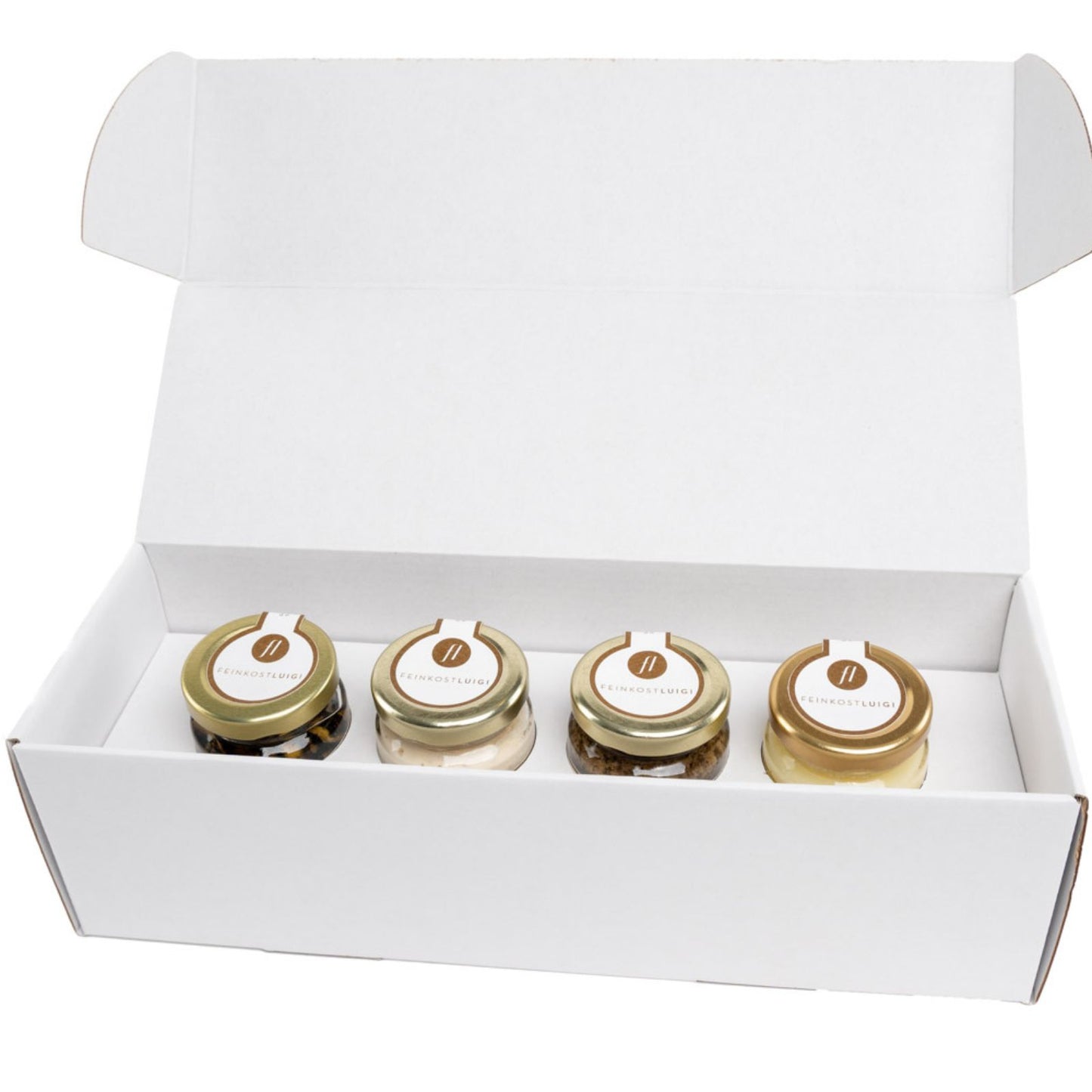 TRÜFFELBOX MIT TRÜFFEL CARPACCIO, SALSA MIT SCHWARZEN UND WEISSEN TRÜFFELN SOWIE TRÜFFELBUTTER