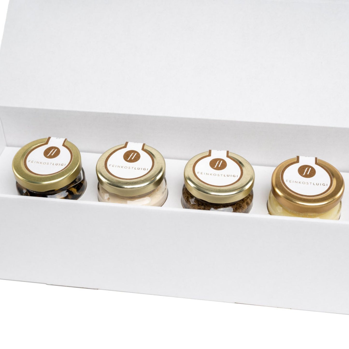 TRÜFFELBOX MIT TRÜFFEL CARPACCIO, SALSA MIT SCHWARZEN UND WEISSEN TRÜFFELN SOWIE TRÜFFELBUTTER